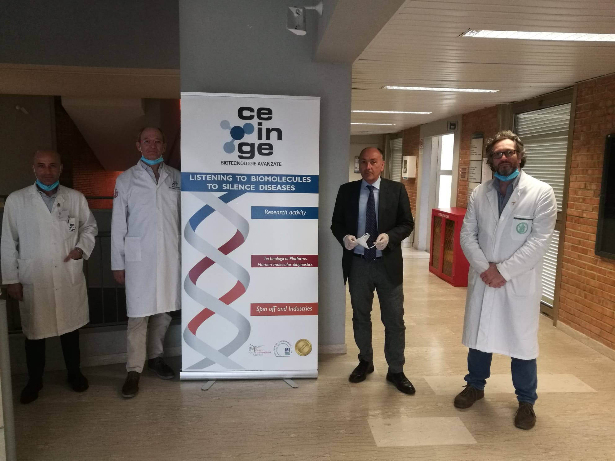 I responsabili del Lab COVID19 del CEINGE- da dx M. Zollo, M. Giustino (Amministratore delegato), G. Castaldo e Ettore Capoluongo-CREDITS@CEINGE